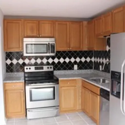 Rent this 3 bed apartment on 13601 Wildflower Lane in Fairfax County, VA 20124