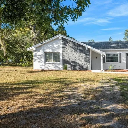 Buy this 2 bed house on 11375 Deep Creek Drive in Spring Hill, FL 34609