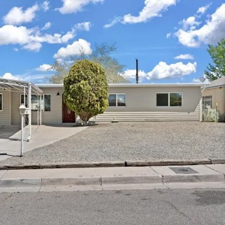 Buy this 3 bed house on 4049 Delamar Avenue Northeast in Albuquerque, NM 87110