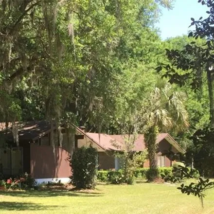 Buy this 3 bed house on 8268 Northwest 5th Court in Alachua County, FL 32607