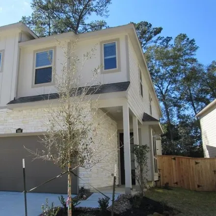 Rent this 3 bed house on Royal Arch Drive in Conroe, TX 77301