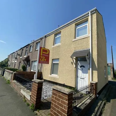 Rent this 2 bed townhouse on Tomlea Avenue in Bedlington Station, NE22 5NA