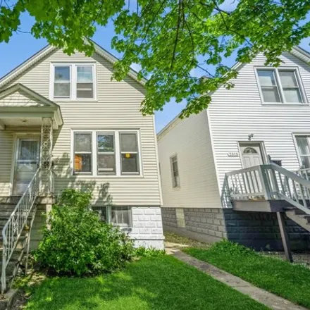 Buy this 3 bed house on 2317 N Lockwood Ave in Chicago, Illinois