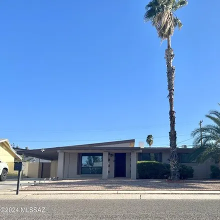 Buy this 4 bed house on 6136 East 35th Street in Tucson, AZ 85711