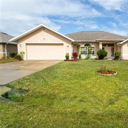 Buy this 4 bed house on 24 Ferngate Lane in Palm Coast, FL 32137