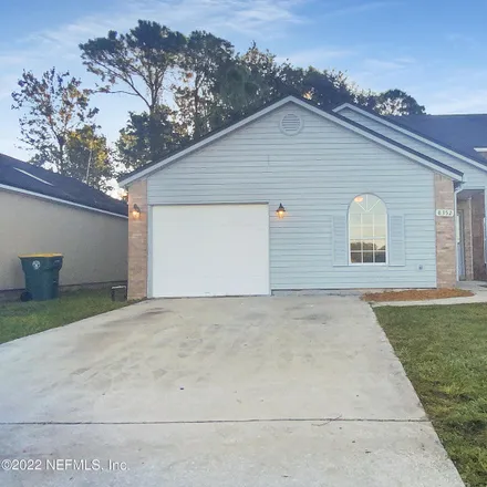 Buy this 4 bed house on 8352 Century Point Drive South in Jacksonville, FL 32216