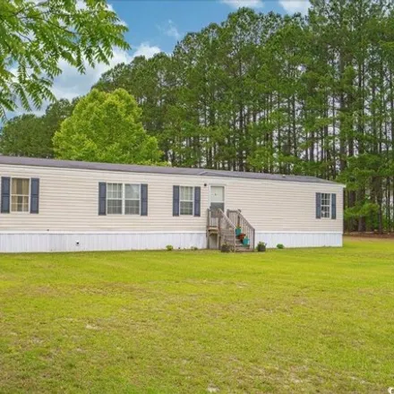 Buy this studio apartment on 8693 Black Creek Road in Horry County, SC 29581