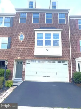 Rent this 3 bed townhouse on 25795 Clairmont Manor Sq in Aldie, Virginia