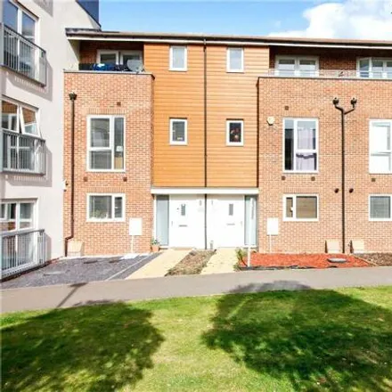 Buy this 4 bed townhouse on Bowling Green Close in Bletchley, MK2 2FG