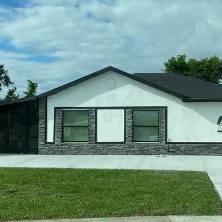 Buy this 3 bed house on 696 Floral Lane Northeast in Port Charlotte, FL 33952