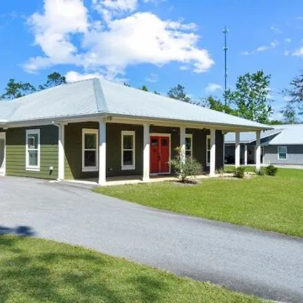 Buy this 3 bed house on 478 West River Road in Wewahitchka, FL 32465