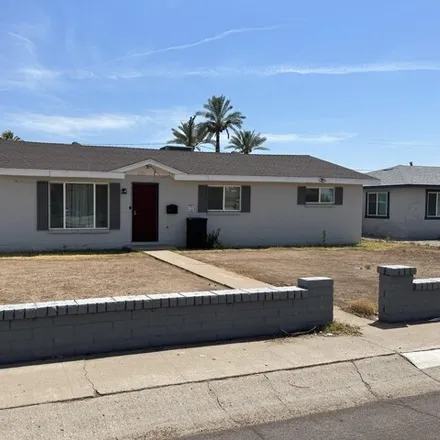 Buy this 4 bed house on 2201 West Bethany Home Road in Phoenix, AZ 85015