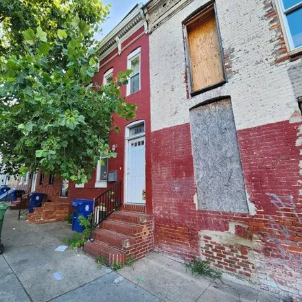 Buy this 3 bed townhouse on 219 S Fulton Ave in Baltimore, Maryland