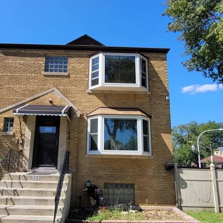Buy this 6 bed house on 6600 S Kilpatrick Ave in Chicago, Illinois