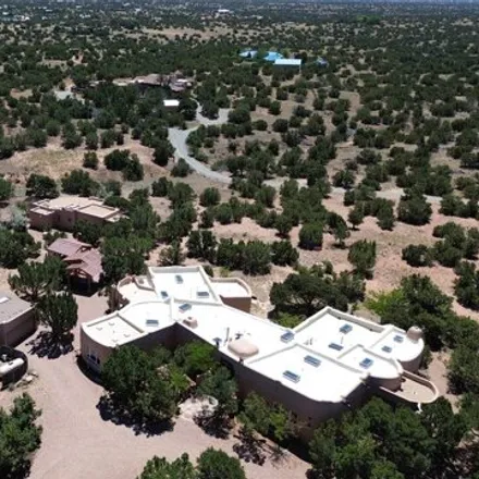Buy this 5 bed house on 99 Hondo Trail in Santa Fe County, NM 87508