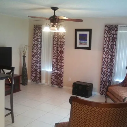 Rent this 4 bed townhouse on 11132 Southwest 17th Manor in Pine Island, FL 33324