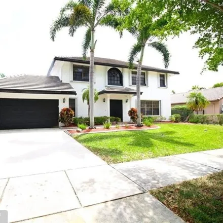 Rent this 4 bed house on 4980 Northwest 48th Avenue in Coconut Creek, FL 33073