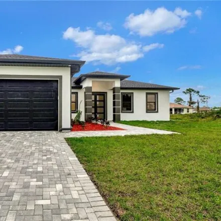 Buy this 3 bed house on 3114 39th St Sw in Lehigh Acres, Florida