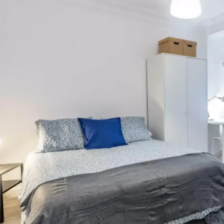 Rent this 5 bed room on Unión Sindical Obrera de la Comunidad Valenciana in Carrer de Joan Baptista Vives, 9