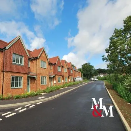 Rent this 3 bed townhouse on Poppy Lane in Soulbury, LU7 0GS