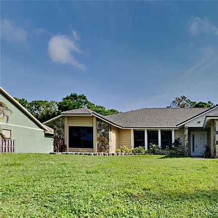 Buy this 3 bed house on 1643 Zaffer Street Northwest in Palm Bay, FL 32907
