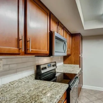 Rent this 2 bed apartment on 3842 East Elm Street in Phoenix, AZ 85018