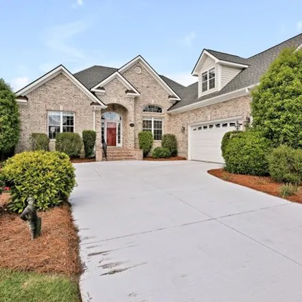 Buy this 4 bed house on 1310 Grandiflora Drive in Leland, NC 28451