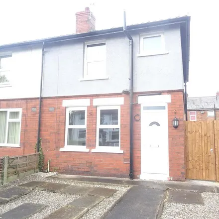 Rent this 3 bed townhouse on 142 Warrington Road in Leigh, WN7 3EB