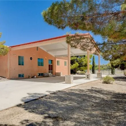 Buy this 5 bed house on 2614 Rockin Doc Road in Pahrump, NV 89048