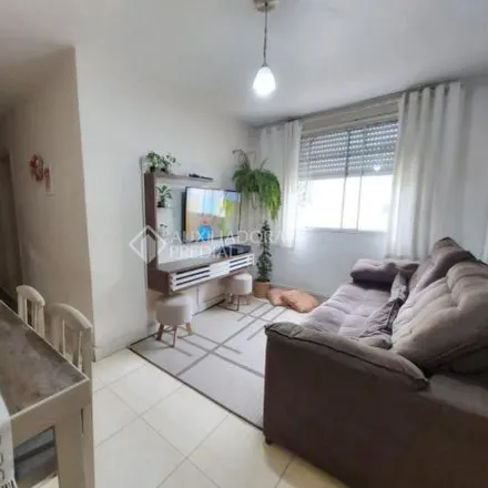 Buy this 3 bed apartment on unnamed road in Vila Nova, Porto Alegre - RS
