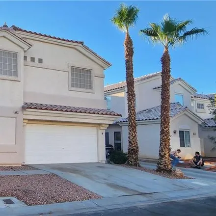 Rent this 3 bed loft on 5991 Crumbling Ridge Street in Clark County, NV 89011