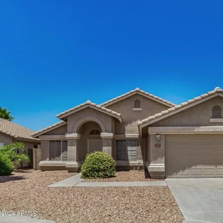 Buy this 4 bed house on 15008 W Elko Dr in Surprise, Arizona