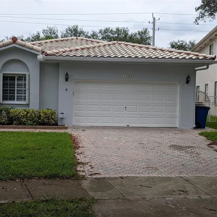 Rent this 3 bed house on 12381 Natalies Cove Road in Cooper City, FL 33330