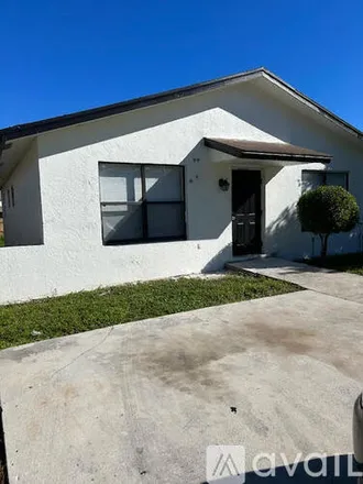 Rent this 3 bed house on 1148 W 31st St