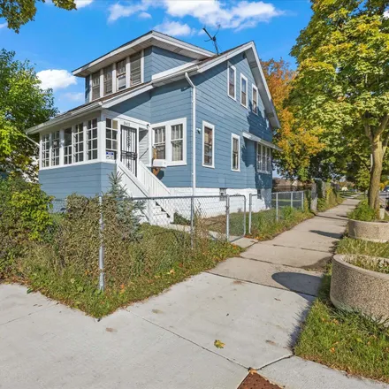 Buy this 4 bed house on 2402 West Garfield Avenue in Milwaukee, WI 53205