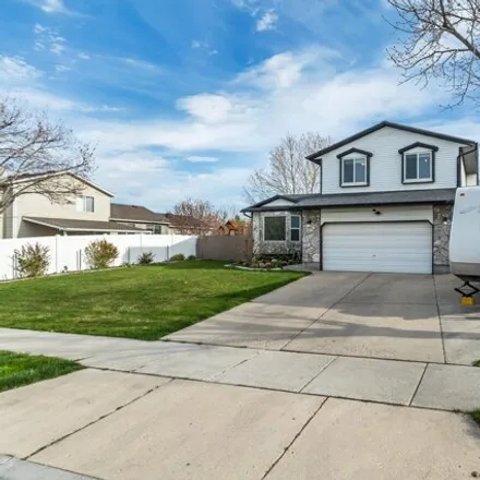 Buy this 4 bed house on 5931 Eaton Way in Kearns, UT 84118