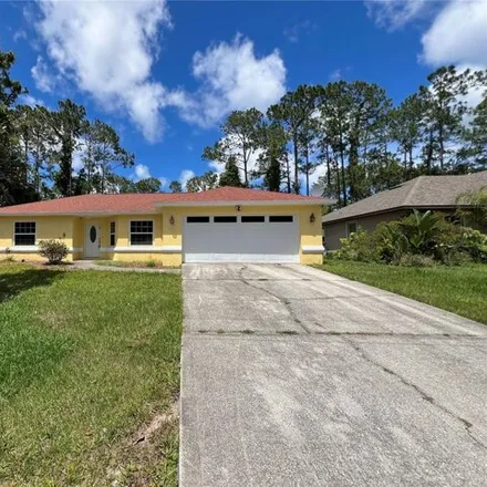 Buy this 3 bed house on 39 Pony Express Dr in Palm Coast, Florida