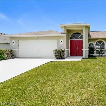 Rent this 3 bed house on 206 Northwest 13th Street in Cape Coral, FL 33993