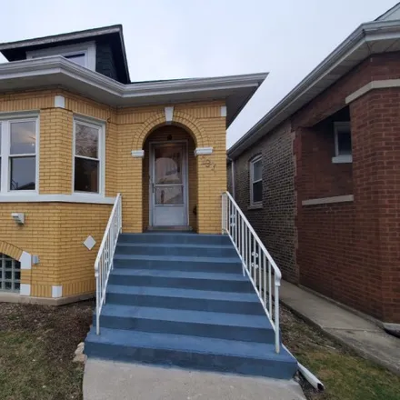 Buy this 4 bed house on 2907 North Luna Avenue in Chicago, IL 60641
