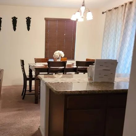 Rent this 4 bed house on Queen Creek