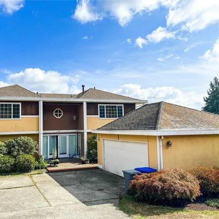 Buy this 6 bed house on 128 174th Place Northeast in Bellevue, WA 98008