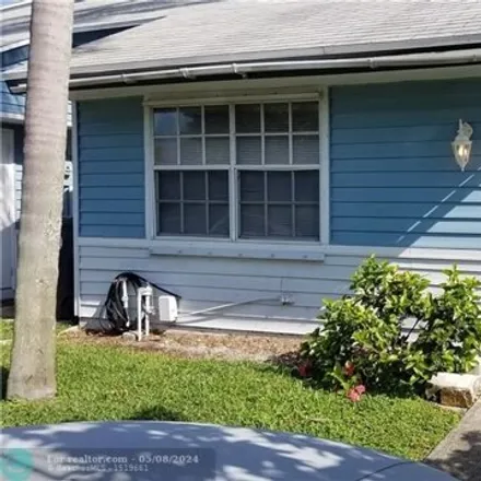 Rent this 2 bed house on 7407 Tam Oshanter Boulevard in North Lauderdale, FL 33068