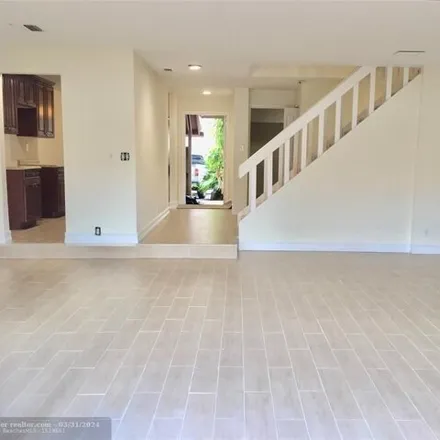 Rent this 4 bed townhouse on 8227 Northwest 8th Place in Plantation, FL 33324