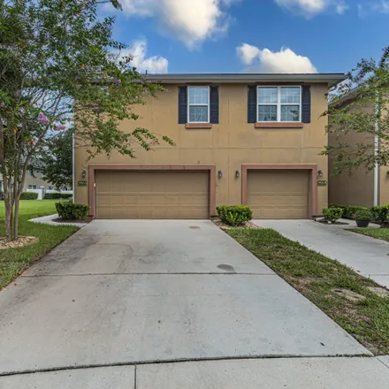 Buy this 4 bed townhouse on 3913 Buckthorne Drive in Clay County, FL 32065