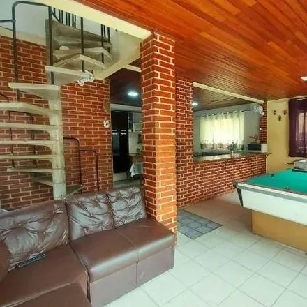 Buy this 4 bed house on Rua Major Rubens Vaz in Canto do Forte, Praia Grande - SP