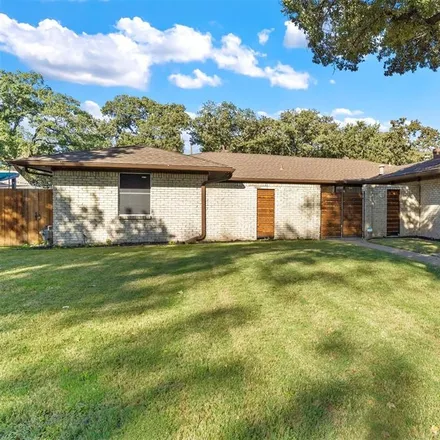 Rent this 3 bed house on 1521 Oak Creek Drive in Hurst, TX 76054