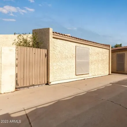 Buy this 2 bed house on 6411 East Covina Street in Maricopa County, AZ 85205