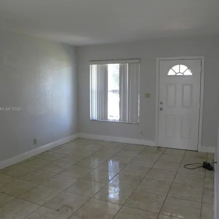 Rent this 3 bed apartment on 22320 South Allapattah Road in Goulds, FL 33170