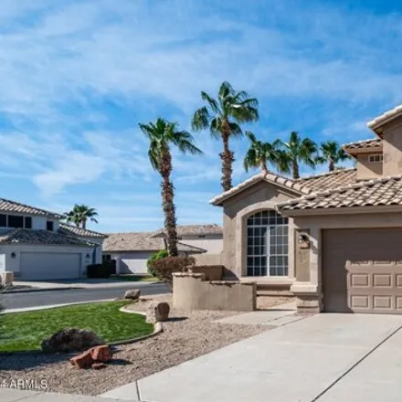 Buy this 4 bed house on 7452 West Los Gatos Drive in Glendale, AZ 85310