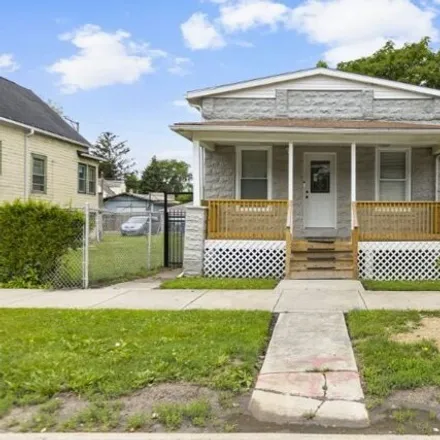 Rent this 3 bed house on 9214 South Woodlawn Avenue in Chicago, IL 60619